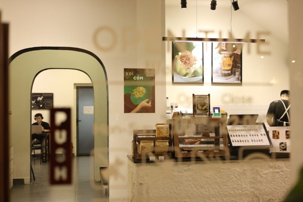 A restaurant interior is visible through the glass door.-United arab emirates food and drinks