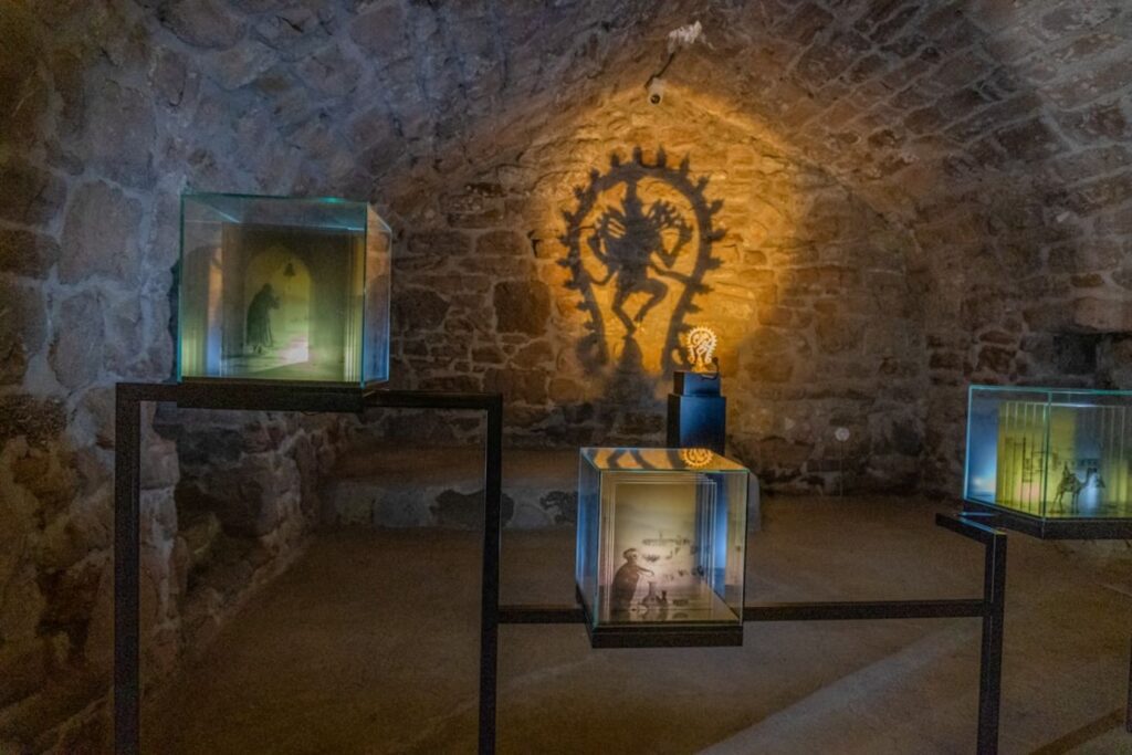 Shadow of shiva dancing on stone wall-Azerbaijan temple