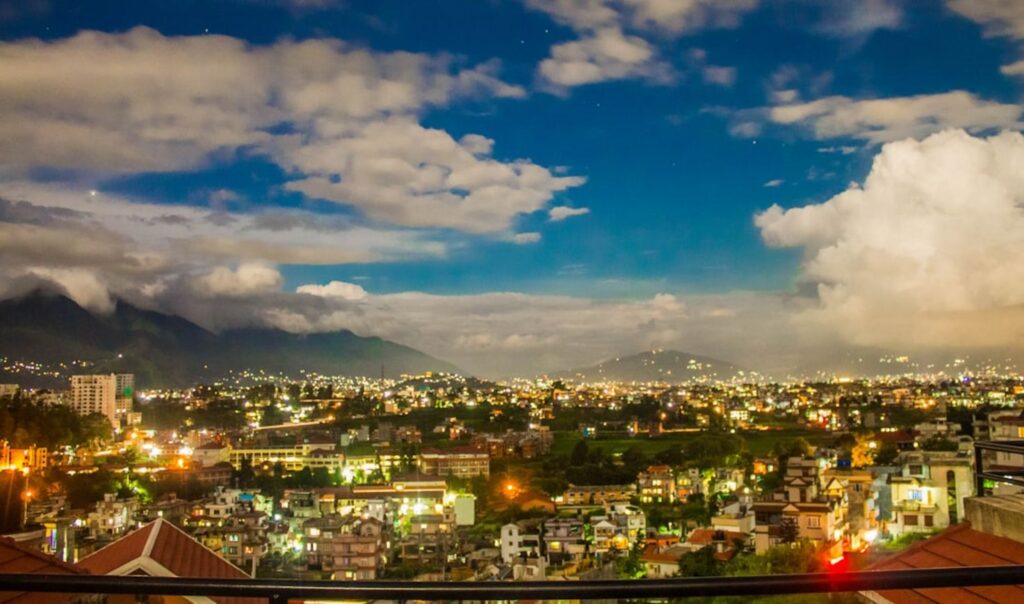 Cityscape at night with mountains in background-Nepal mountain