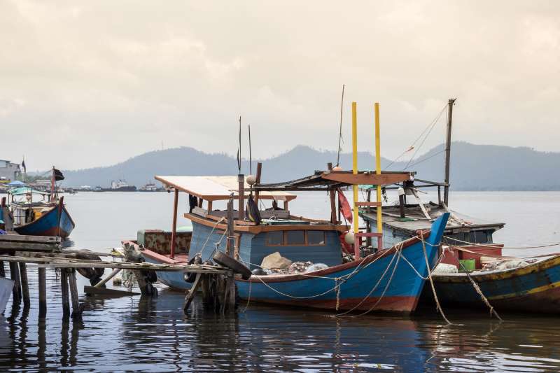 fishing boats in village indonesia kalimantan borneo